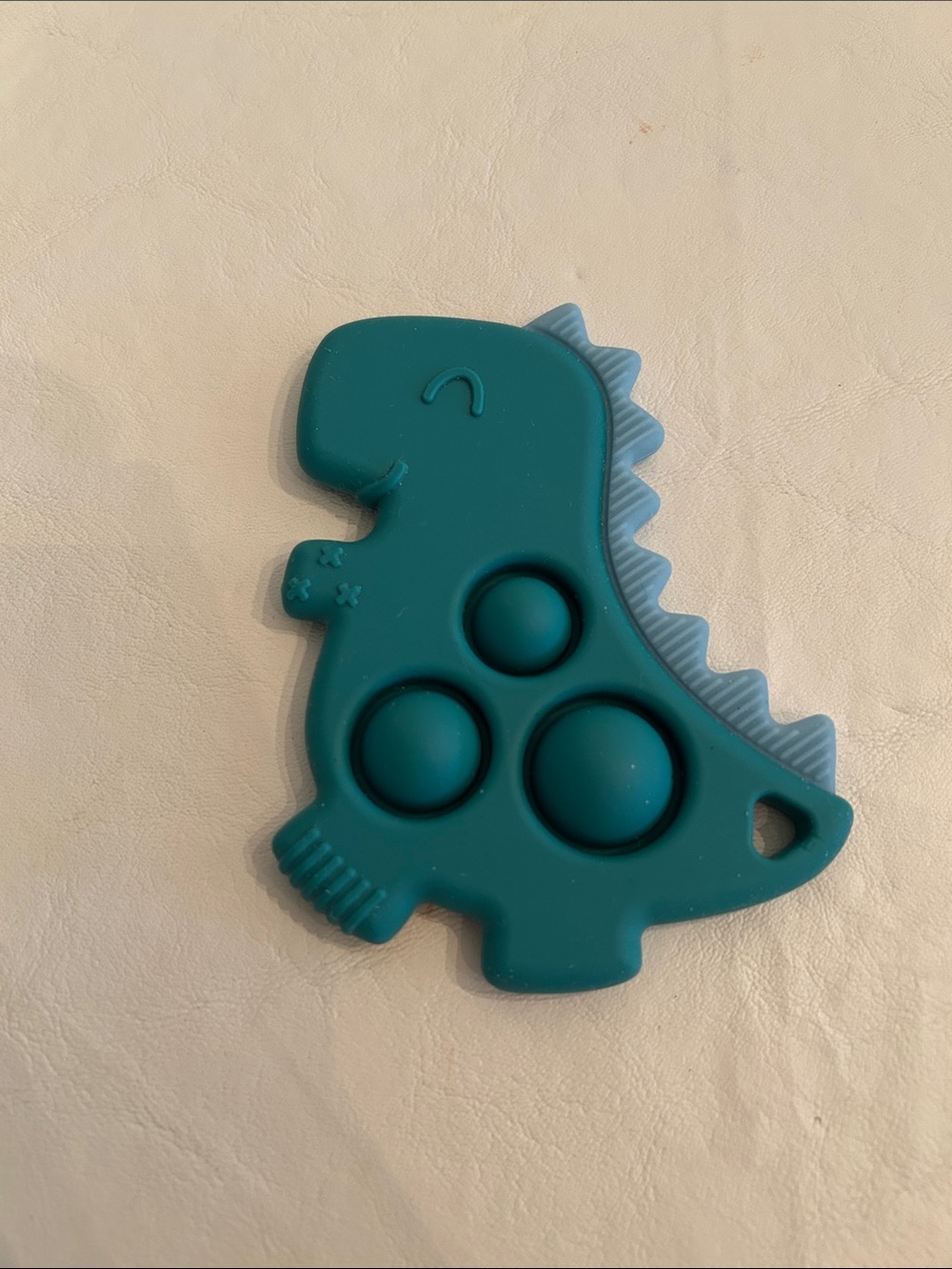 Itzy Ritzy Dinosaur Silicone Pop It Fidget Toy